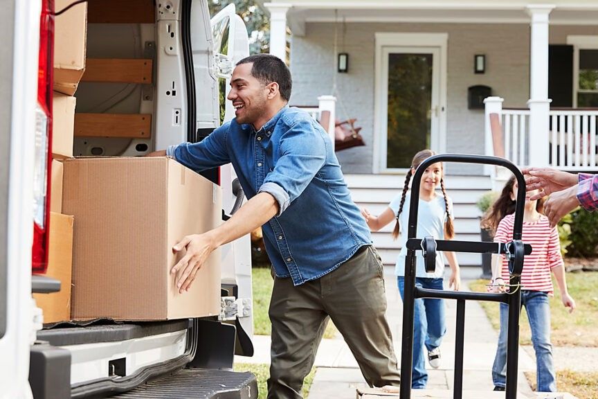 generic family moving loading boxes stock image