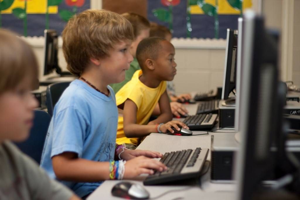 students testing at a computer