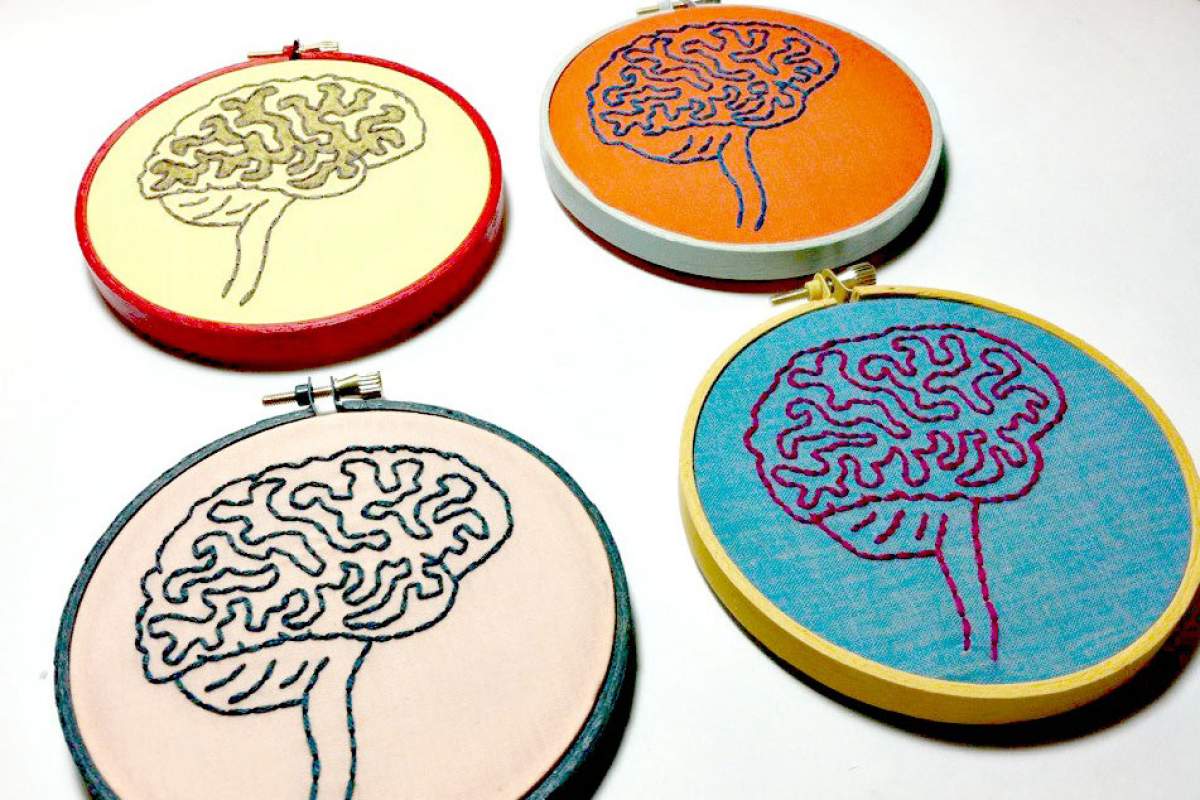 A set of four crocheted brains
