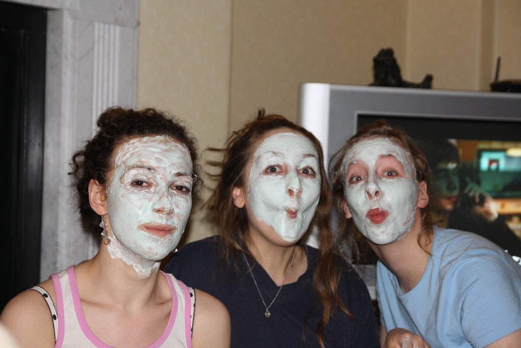 three women with face masks on