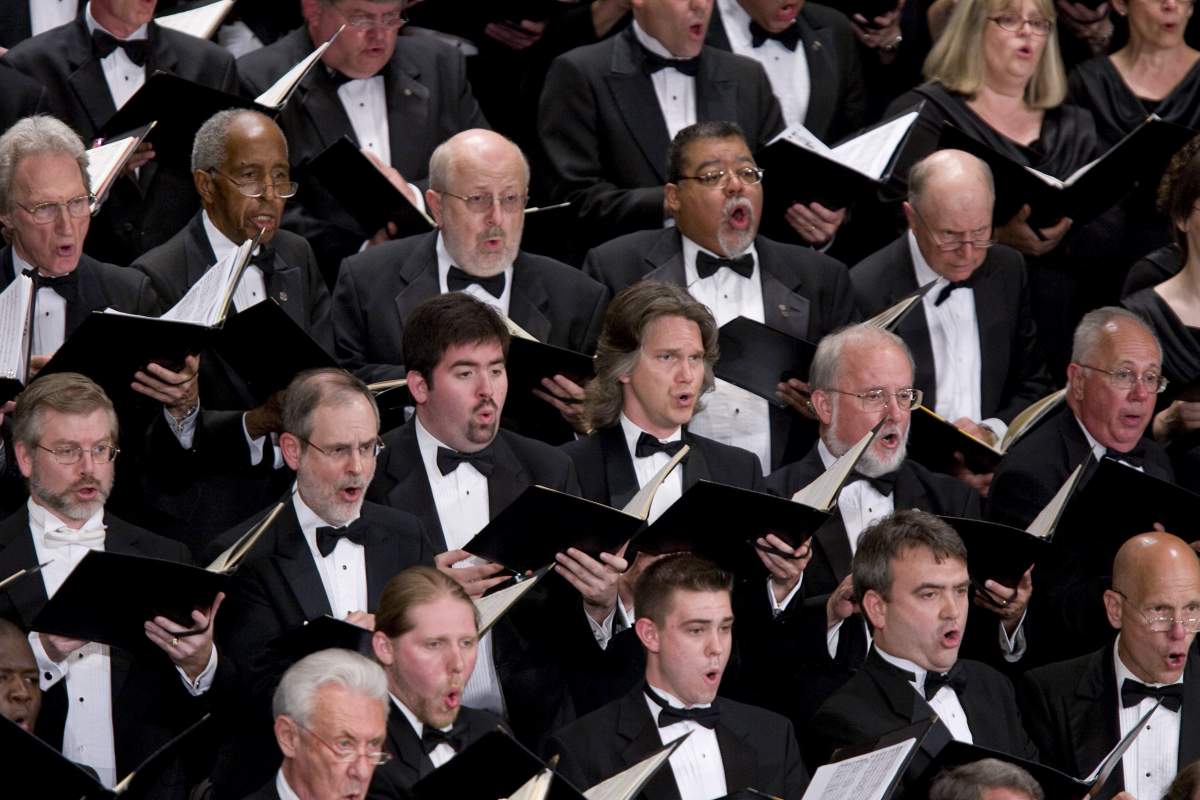 A choir in concert dress performs