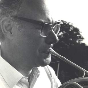 A man playing horn.
