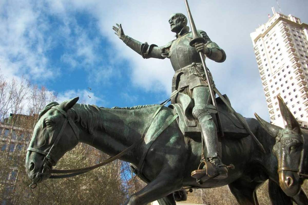 A bronze sculpture of a man on horseback carrying a spear