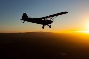 small airplane sunset