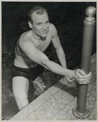 James climbs out of an indoor pool.