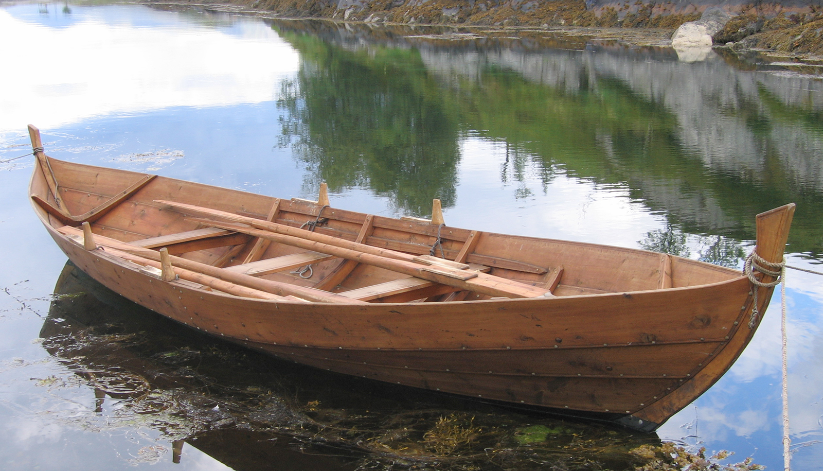row boat on water