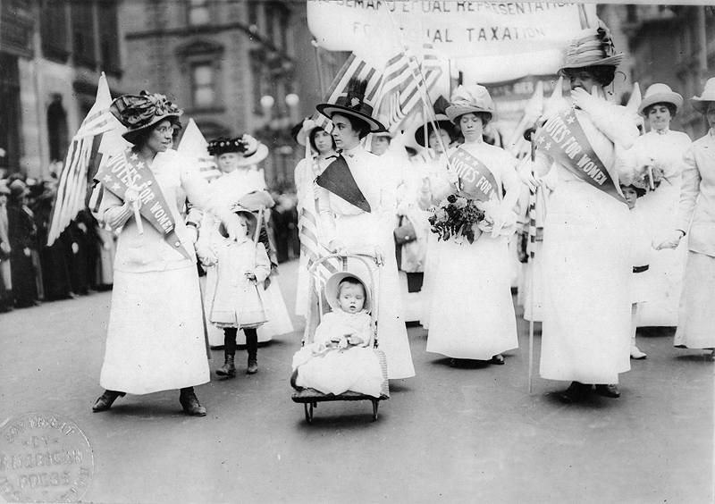 Suffragettes parading