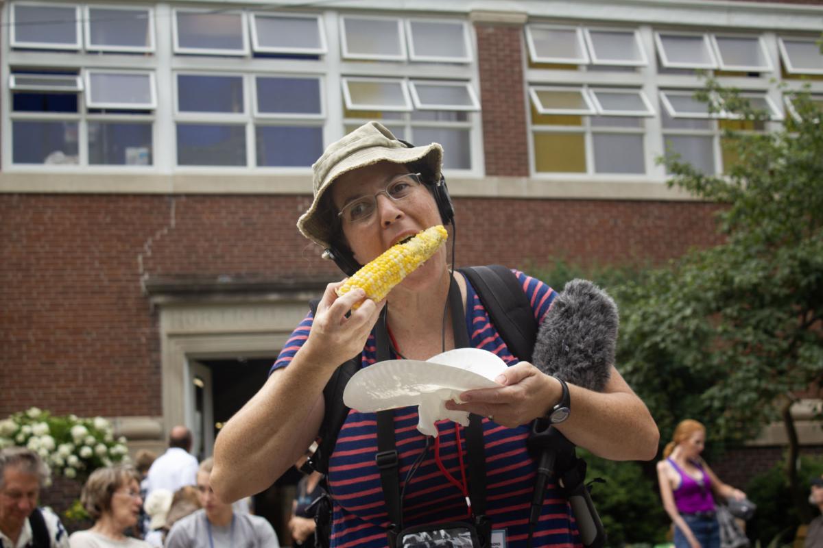 Person eating corn 