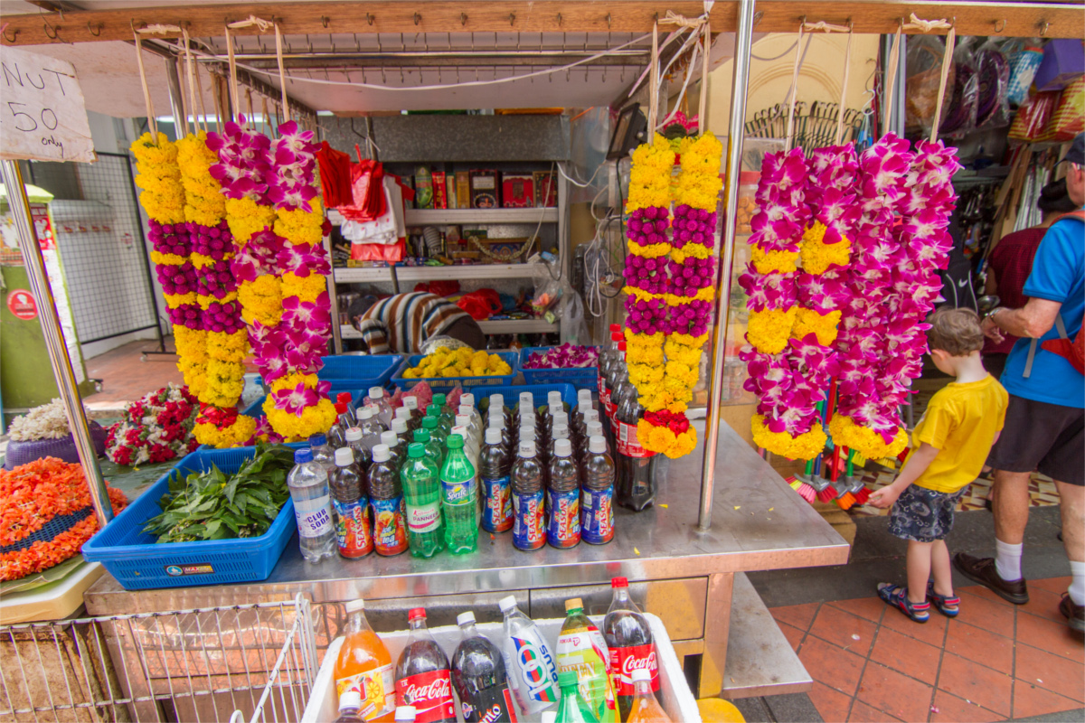 A brightly colored display in a shop in Singapore, including sugary drinks. 