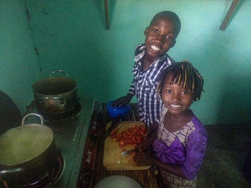 children preparing a meal 