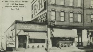 Old post card with sepia tone image of a build, and labeled as the Stapleton Chop House in New York