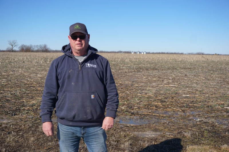 Tim Gottman standing in a field 
