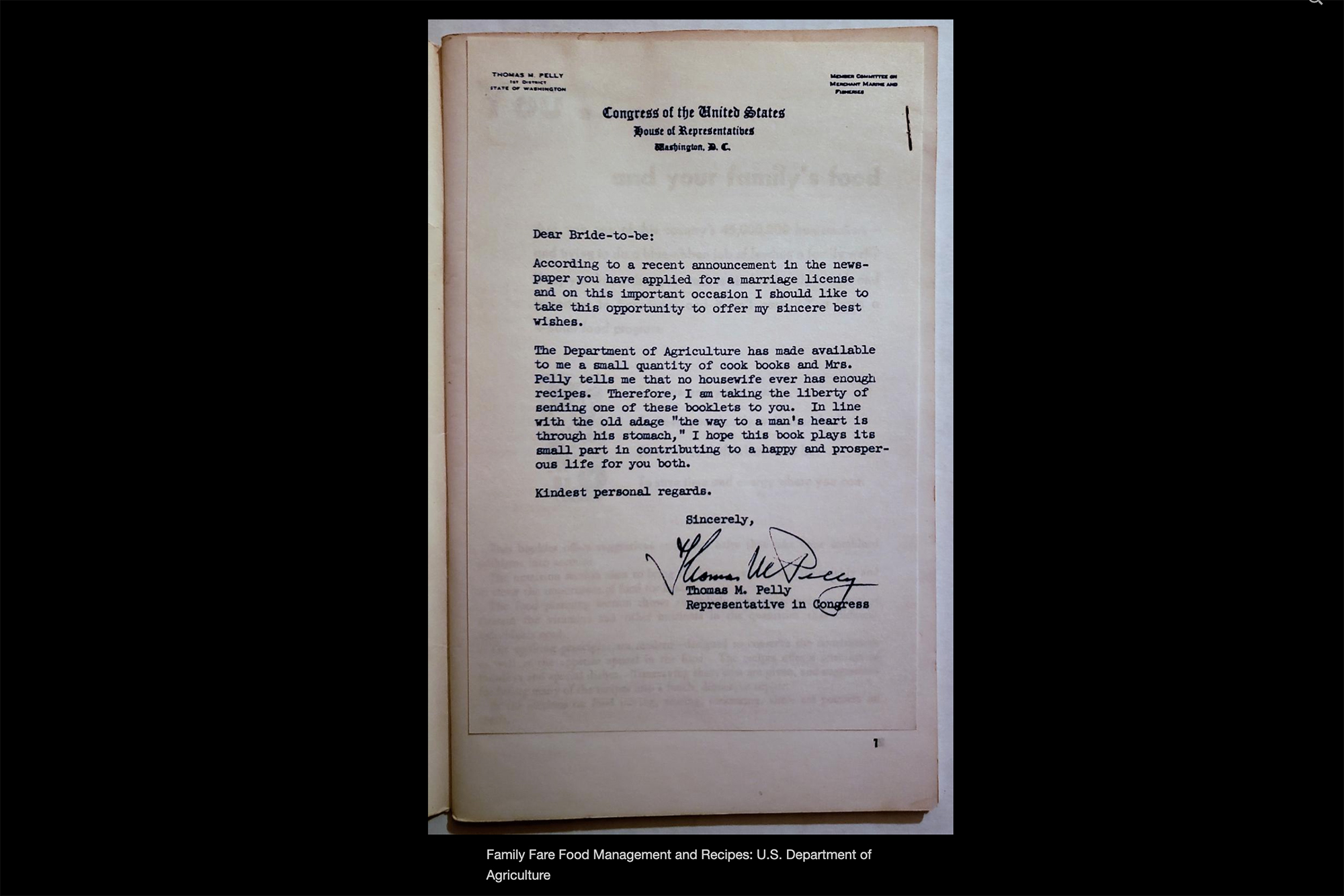 An image of a letter written by Congressman Thomas Pelly to a "Bride-to-be," saying that he learned of her upcoming wedding through a newspaper announcement and he is giving her this cookbook, since "the way to a man's heart is through his stomach."