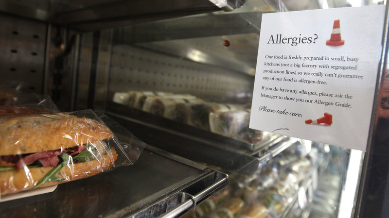 An allergy warning notice is displayed next to food in a branch of Pret A Manger in central London.