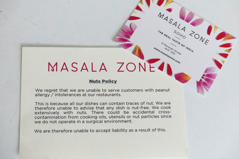 A card stating that it's not the policy of London's Masala Zone restaurant to serve people with peanut allergies.