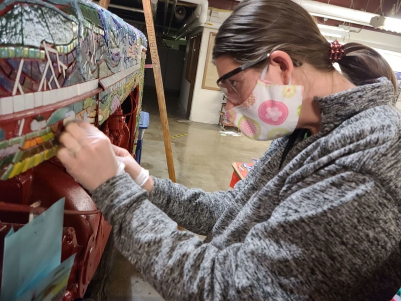 Theresa Young working on a mosaic