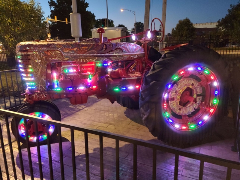 A mosaiced tractor with lights 