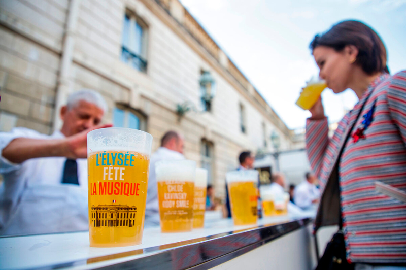 A woman drinking a alcohol-free beer