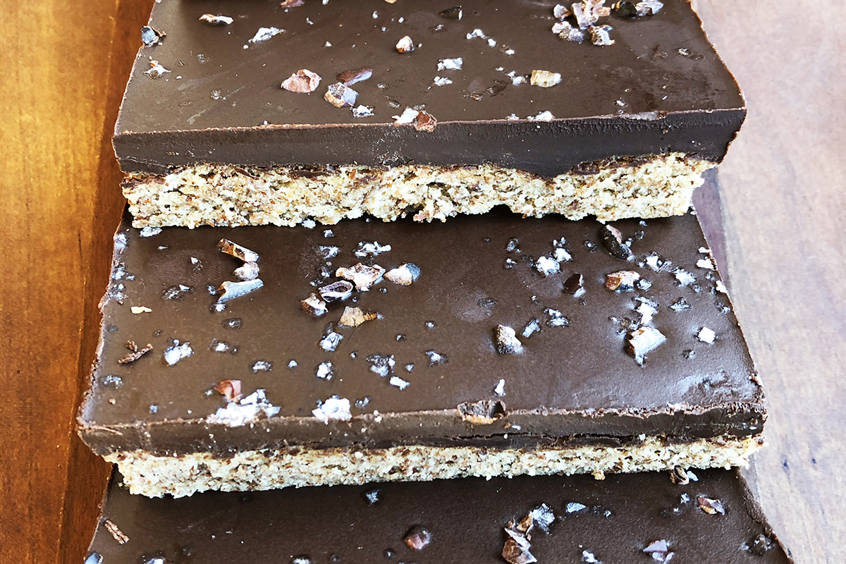 Baked bars with a smooth layer of chocolate and coarse salt sprinkled on top.