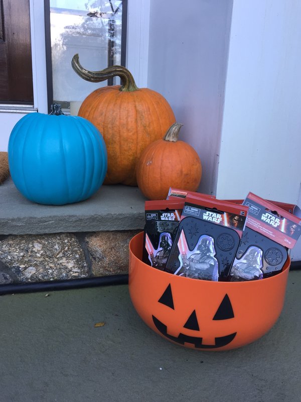 a home with a teal pumpkin and alternative treats