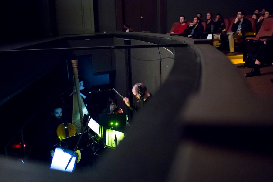 musicians in the pit playing the movie score