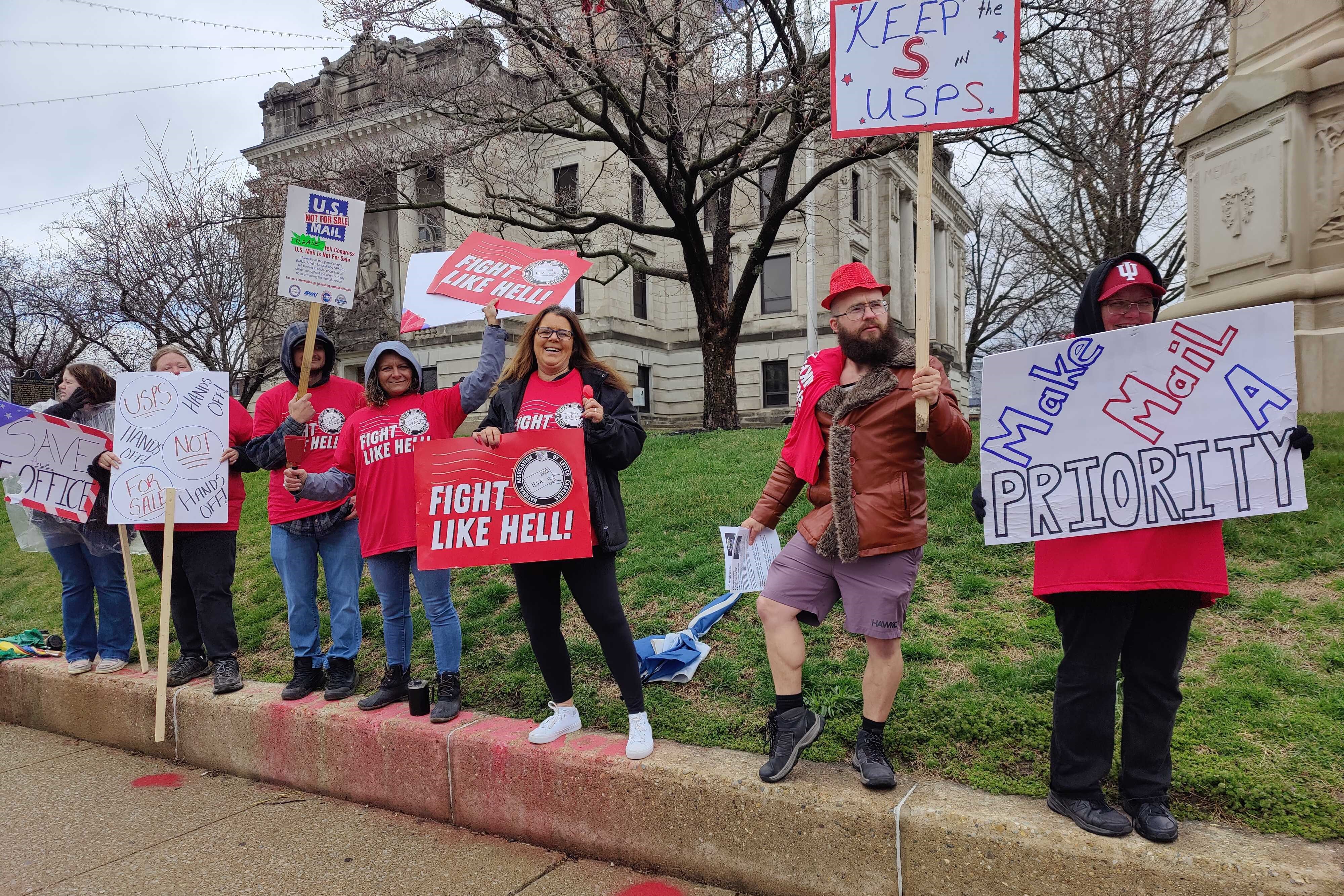 The Bloomington rally was one of dozens across the U.S. over the weekend in support of the USPS. 