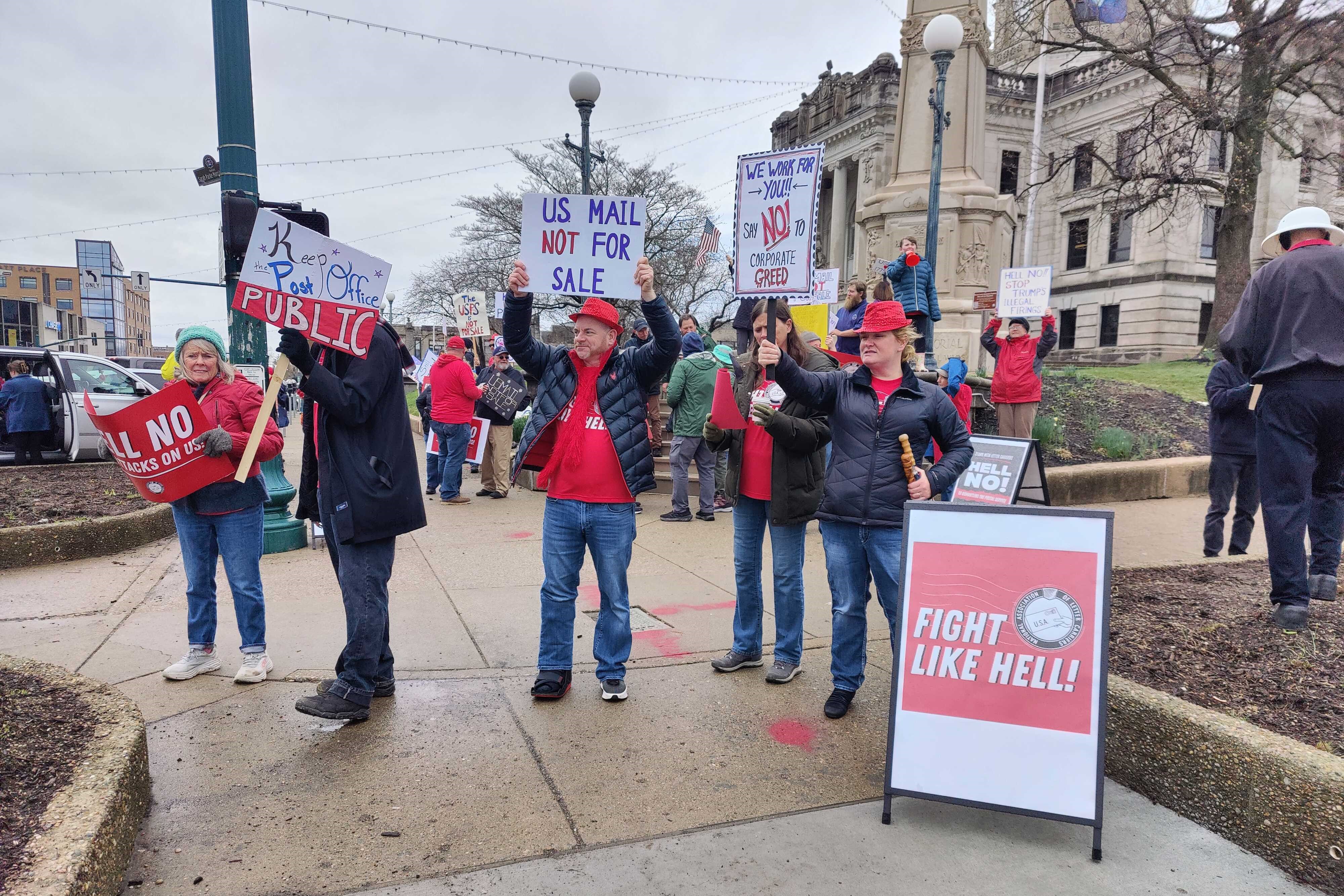 The Bloomington rally was one of dozens across the U.S. over the weekend in support of the USPS.