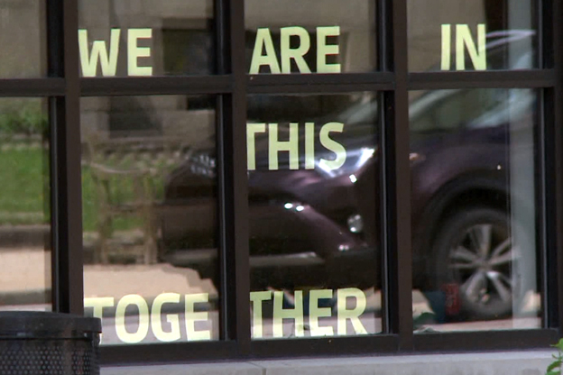 we are in this together, hotel sign