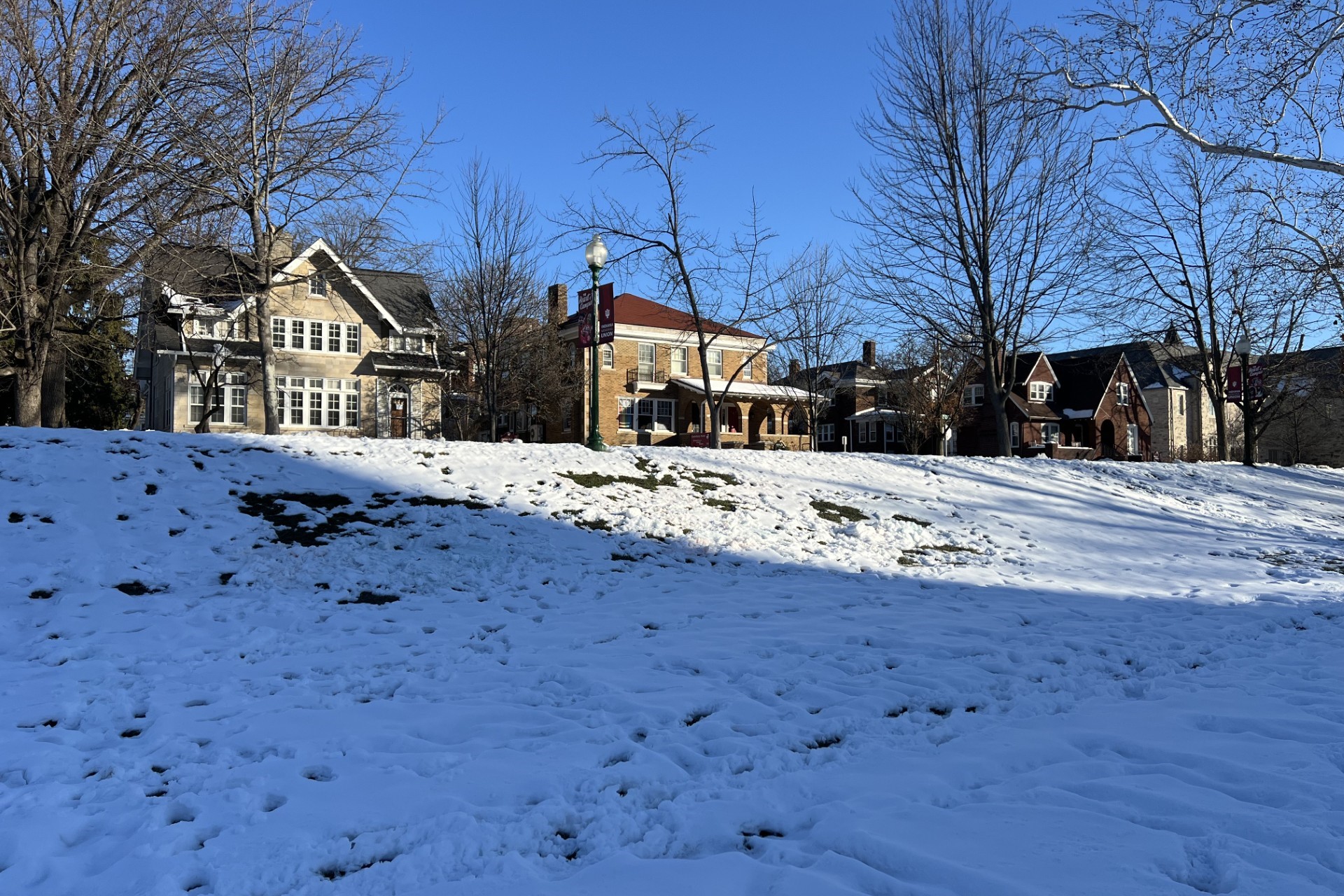 Image showing the former site of painted pro-Palestinian signs removed from snow