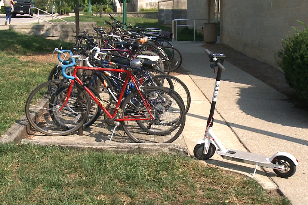 Photo of electronic scooter at a bike rack