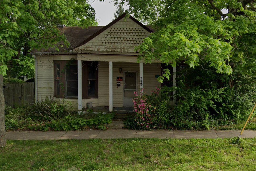A Google Maps Streetview screenshot of 523 W 7th Street in Bloomington (July 2018) which was demolished in September 2019.