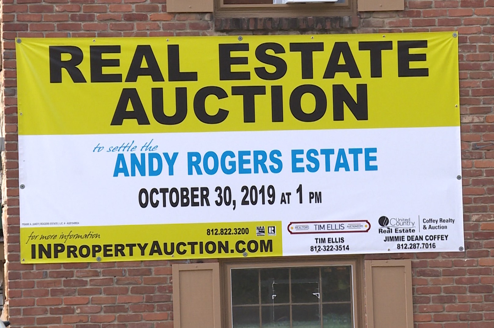 A sign for the auction of multiple properties in Brown County. Sept. 19, 2019.