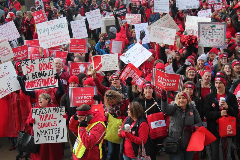 Thousands of educators and public education supporters flooded the statehouse lawn in November 2019, to demand additional funding for schools and teacher compensation.