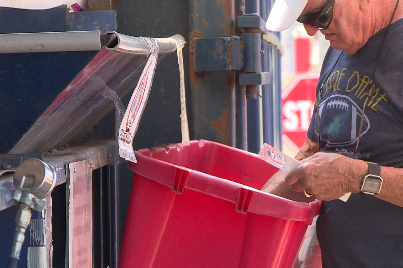 Man recycles at solid waste management district