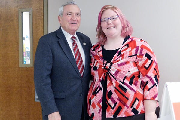 Fort Wayne Mayor Tom Henry and Easterseals Arc participant Shelby pose for a photo together after the news conference announcing new workforce development initiatives.