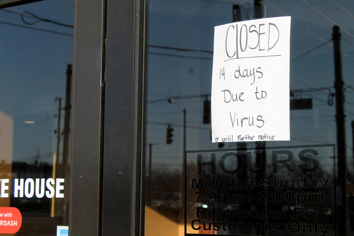 Christina's Pancake House in Indianapolis displays a sign, telling customers they're closed for the next two weeks.