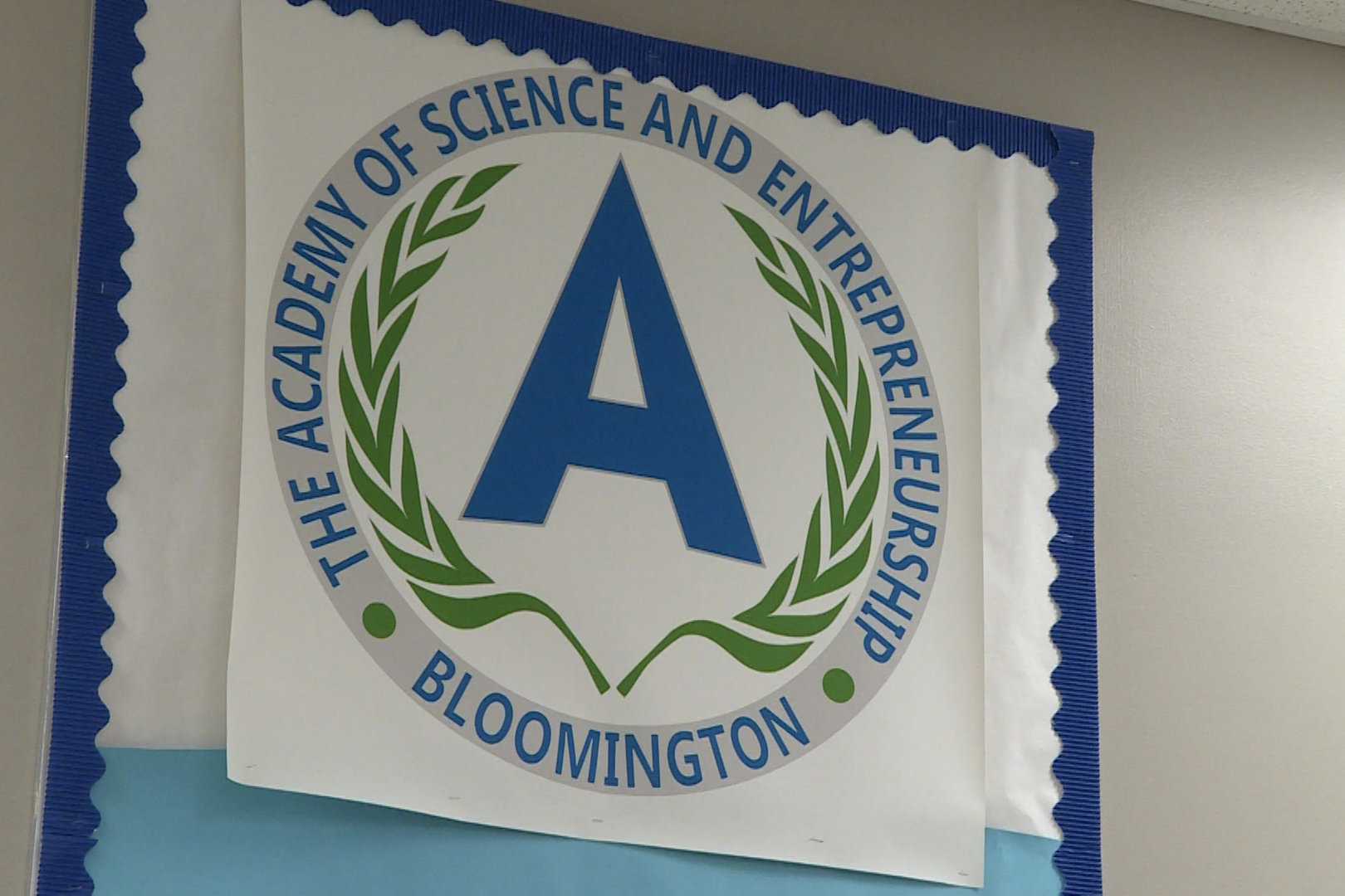 The sign for the Academy of Science and Entrepreneurship in Bloomington