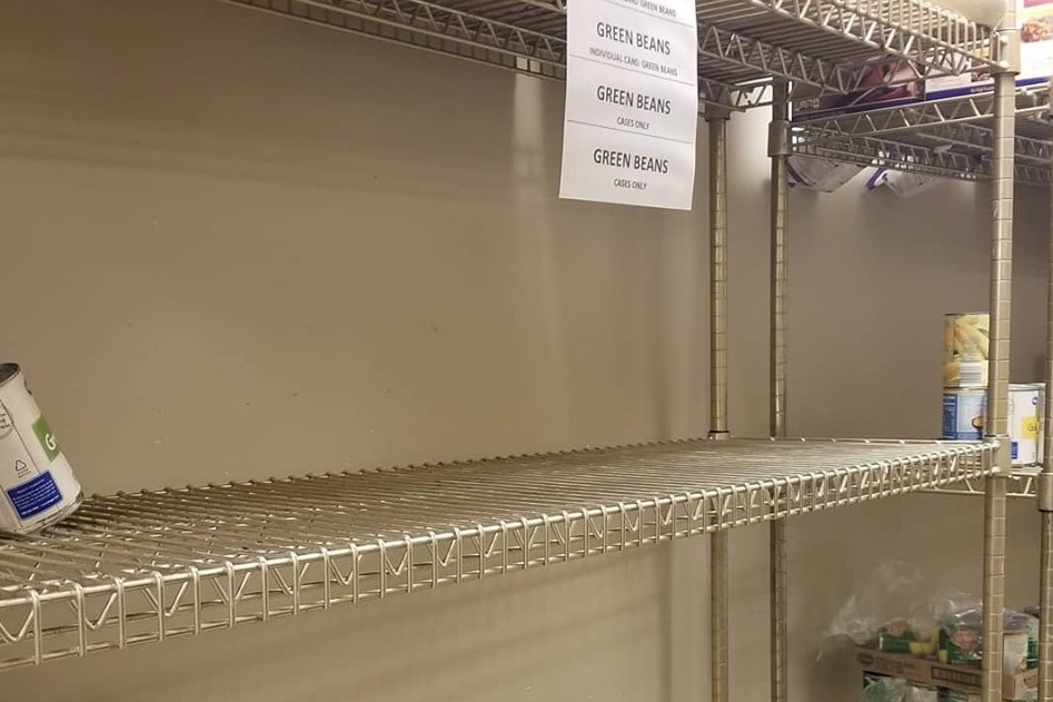 Empty shelves at Community Kitchen of Monroe County.