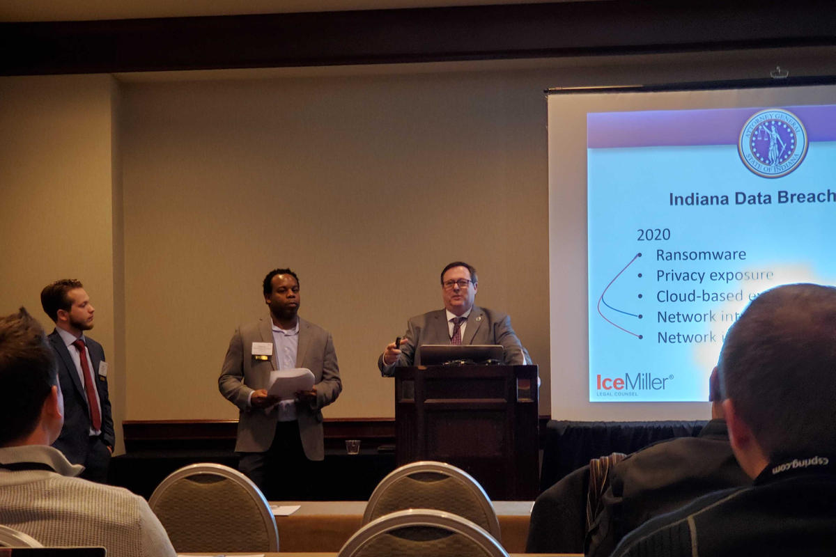 (Left to right) Ice Miller associate Mason Clark and partner Stephen Reynolds present with Office of Attorney General Section Chief Doug Swetnam at the Indiana Chamber 2020 Business Technology Summit.
