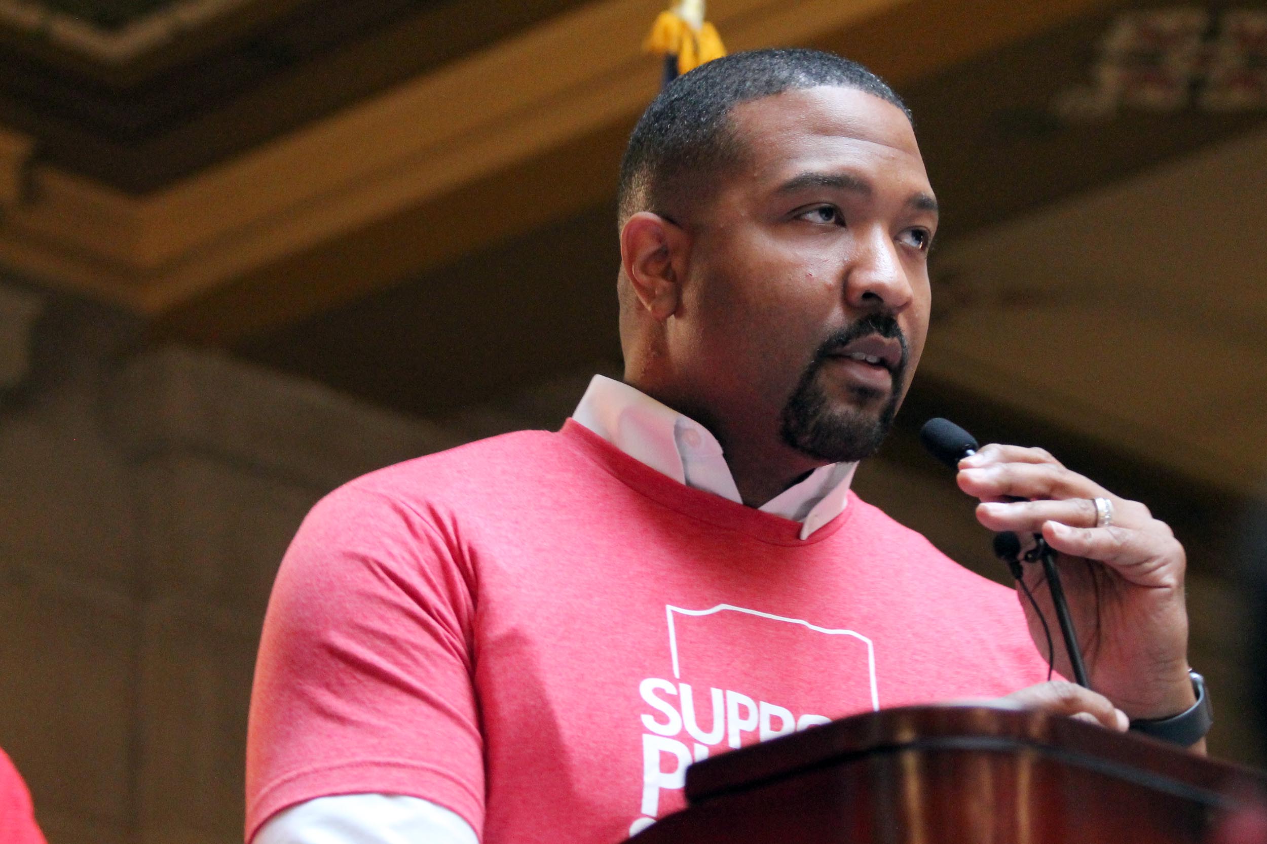 Sen. Eddie Melton (D-Gary) speaks to teachers gathered in the Statehouse, as they begin to chant "Eddie! Eddie!" Melton is running for governor in 2020.