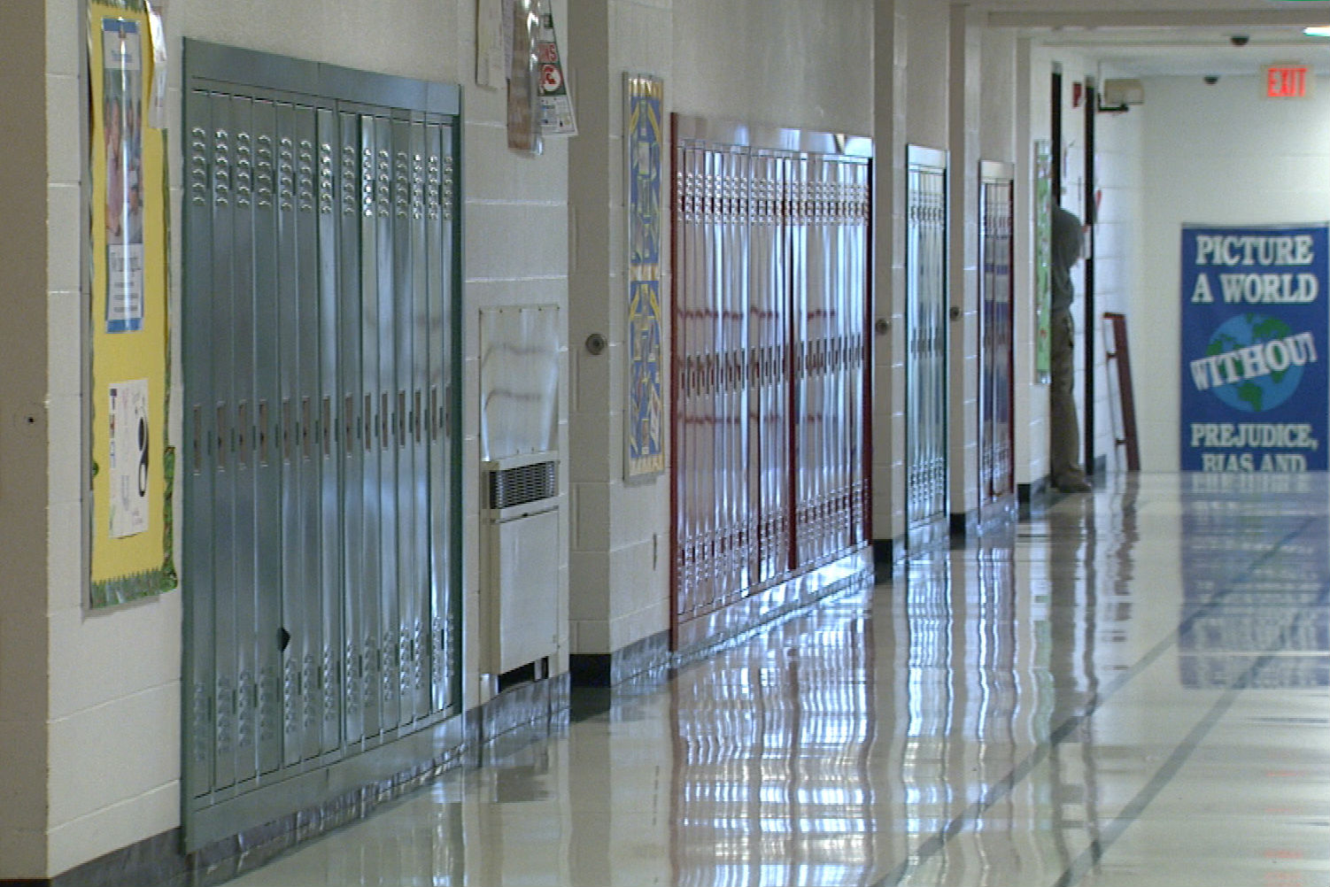 A stock photo of a line of walkers in a healthcare facility.