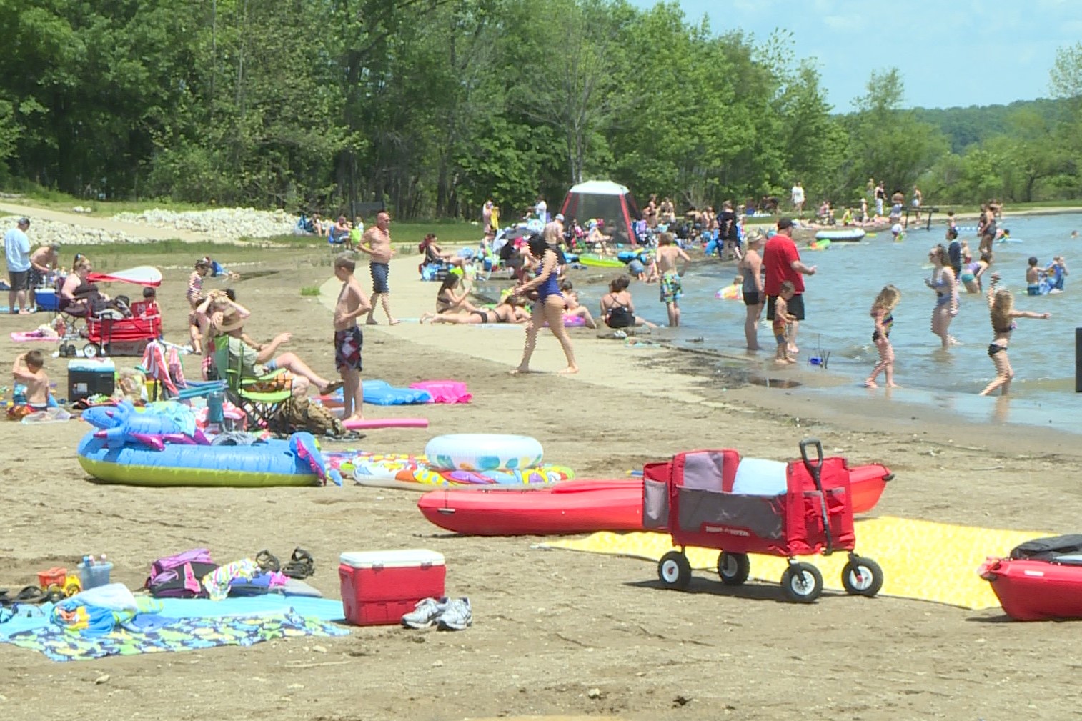 Swimmers and sunbathers crowd Fairfax SRA at Lake Monroe, Memorial Day 2020.