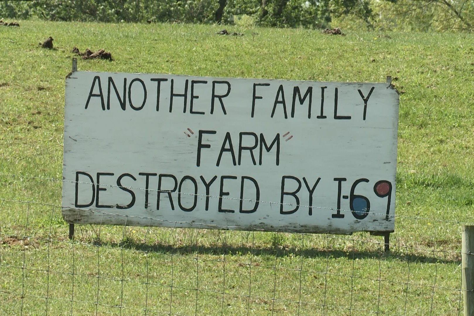 i-69 road sign family farm destroyed