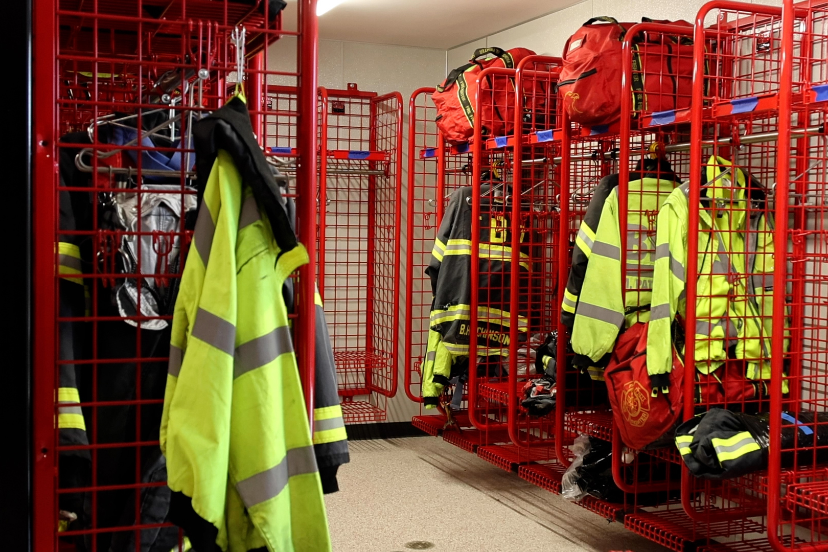 Fire fighter suits hang in the renovated Fire Station 1.