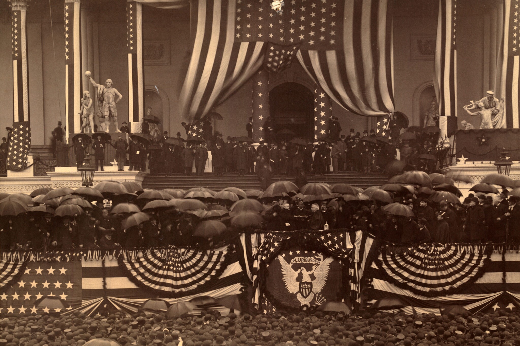 Benjamin Harrison takes the oath of office on the east portico of the United States Capitol during a rainy Inauguration in March 1889