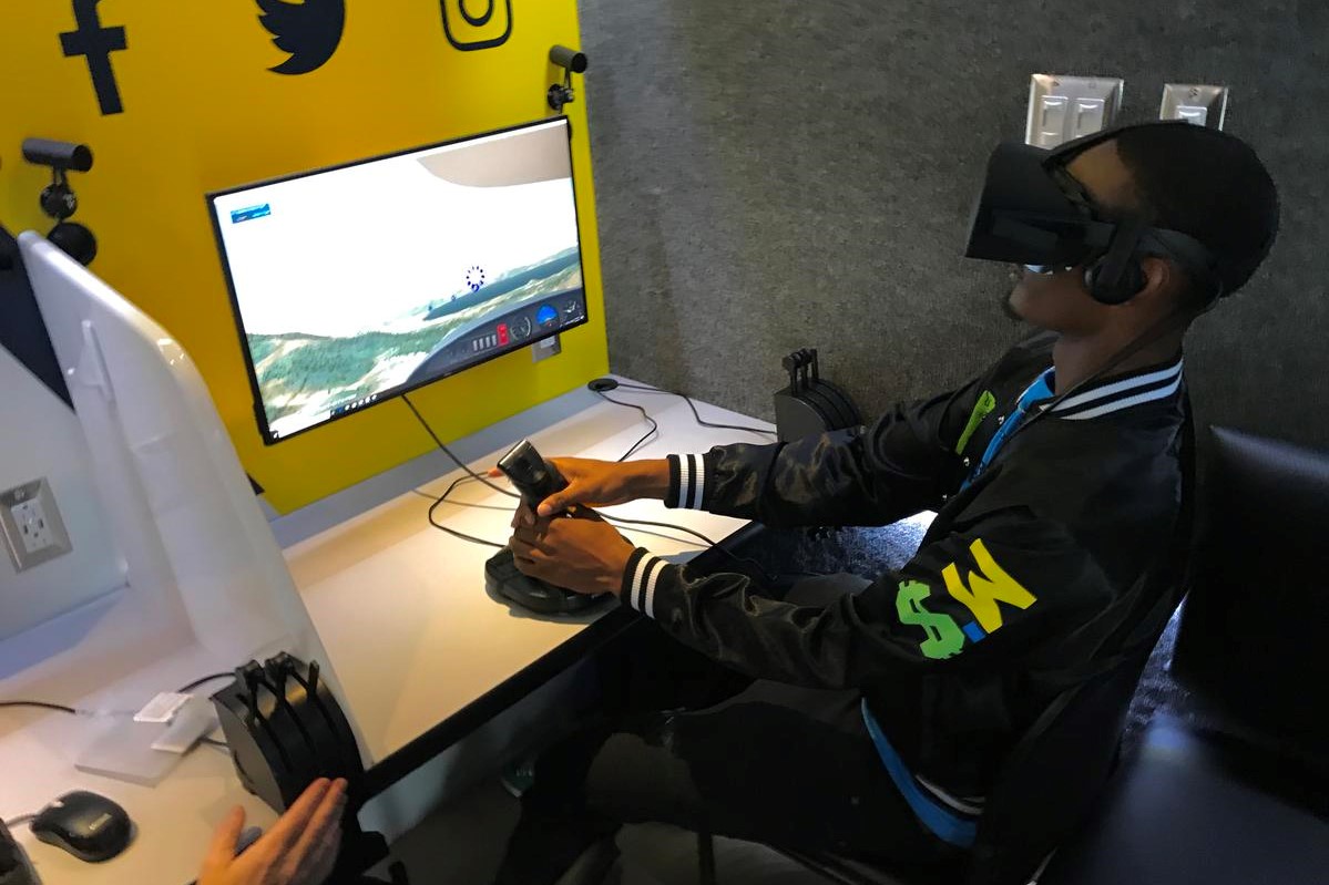student using flight simulator