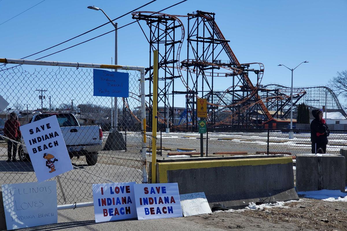 Signs left outside the main gate to Indiana Beach during the rally to save the amusement park in March