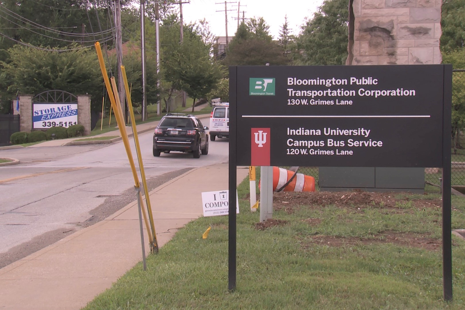 A sign for the IU and Bloomington bus depots, August 2019.