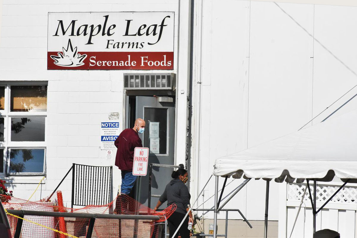 Workers at the Maple Leaf Farms poultry-processing plant in Milford, Indiana.