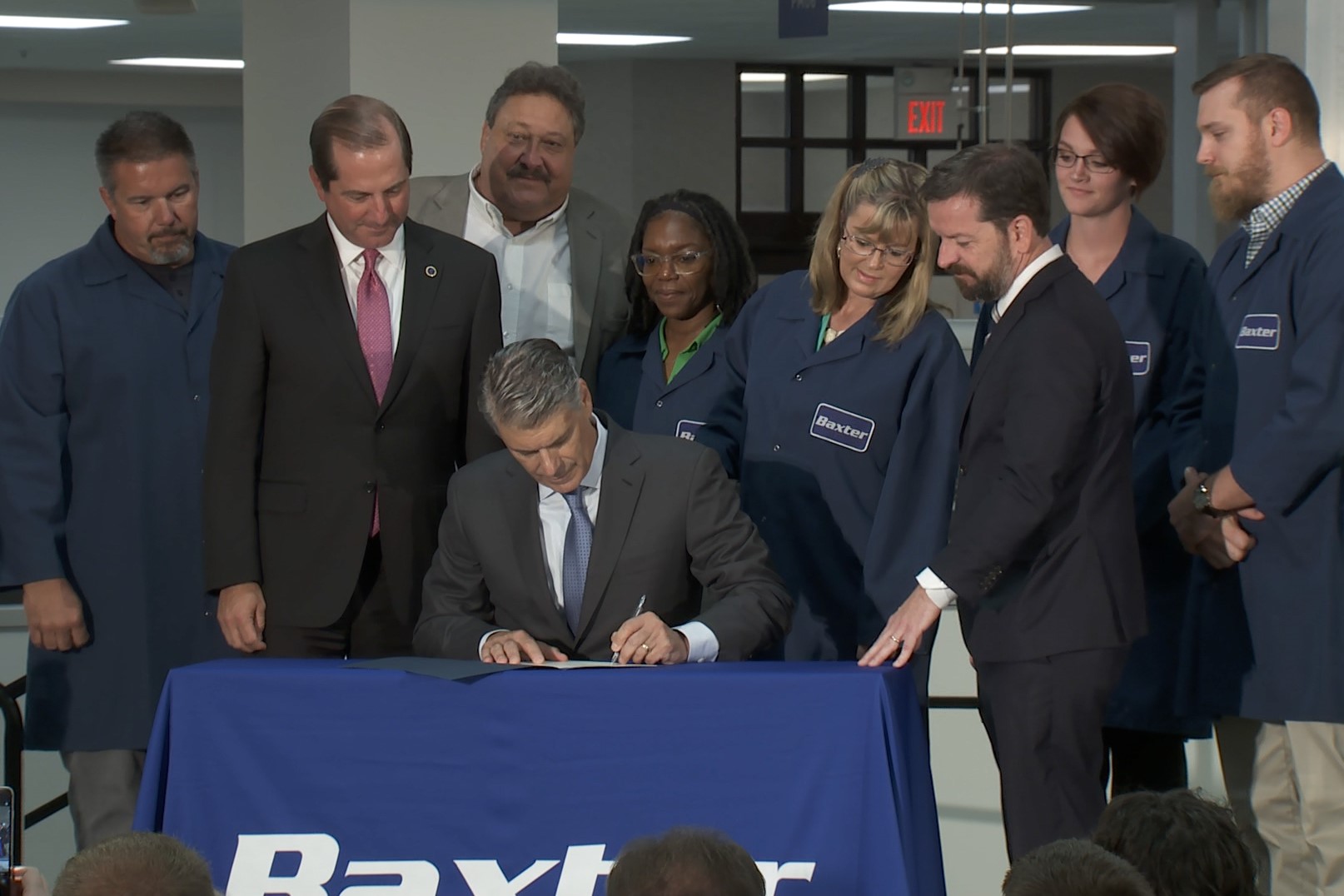 Baxter CEO Joe Almeida signs the Trump administration's "Pledge To America's Workers."
